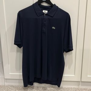 Perfect like- new condition. Navy Lacoste 100% cotton polo shirt.